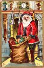 Santa Claus with Toy Sack  By Fireplace Stockings 1910 Christmas Postcard~k354 picture