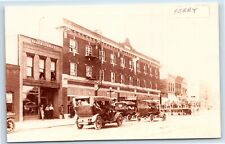 Repro Photo Willis Ave. Hotel and Howard Moody Harness and Buggies in Perry Iowa picture