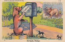 ELK RAPIDS MI – Elk Rapids Dogs with Good Wishes Greetings Postcard - 1938 picture