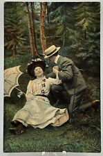 1907-1915 Victorian Woman Faints Into Gentleman’s Arms Romance Postcard  picture