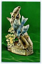 Lionstone Bourbon Whiskey The Bluebird Craftmanship In Porcelain Postcard picture