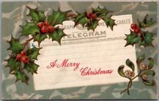 Vintage A MERRY CHRISTMAS Embossed Postcard Telegram / Holly Leaves 1912 Cancel picture