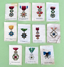 11 ANTIQUE TOBACCO CIGARETTE SILKS FEATURING MILITARY MEDALS B648 picture
