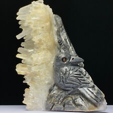 The Natural Crystal Quartz Mineral Specimen Is a Handmade Carved Crow. Boutique. picture