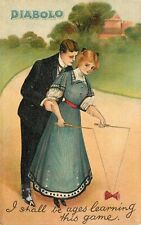 BB London Postcard 2126 Couple Plays Diabolo Together Woman Feigns Ignorance picture