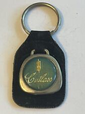 VINTAGE 🇺🇸 “ CUTLASS ” KEYCHAIN KEYRING FOB LEATHER / METAL 👀 LQQK  👀 picture