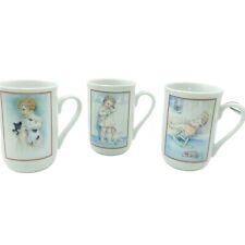 Vintage 1985 Bessie Pease Gutmann cup Set of three Love is Blind Lullaby Plus 1 picture