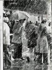 1977 Press Photo Snow falls on Downtown Boston shoppers. - lry06919 picture