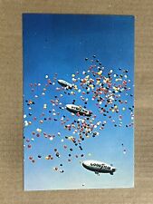 Postcard Akron Ohio OH Three Goodyear Blimps Aerial Ambassadors Balloons picture