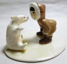 HAGEN RENAKER ESKIMO WITH POLAR BEAR CUB ON BASE ABOUT TO RUB NOSES picture