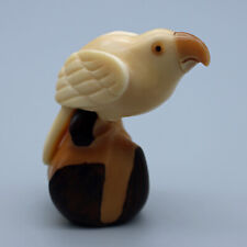 Carved Tagua Parrot Sculpture Perched Upon Another Nut picture