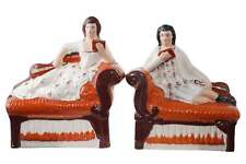 Antique Staffordshire Bookends Man and Woman reclining on sofa picture