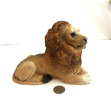 A MAJESTIC LAYING LION CAST FROM STONE CRITTERS, OK. USA picture