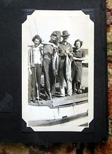 1950s FAMILY PHOTO ALBUM w/ 50 SNAPSHOTS in BOATS on BEACH with BIG FISH  picture