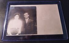 RPPC CIRCA 1908 PHOTO POSTCARD GHOSTLY IMAGE OF WIFE SAD MAN LOOKING ON VERY SAD picture
