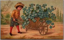 1910s HAPPY BIRTHDAY Embossed Postcard Boy / Forget-Me-Not Flower Cart *Trimmed picture