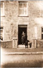 RPPC Woman in Doorway with Big Black Dog, Holding Little Black Dog- Postcard picture