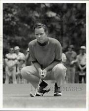 1970 Press Photo Golfer Bruce Crampton lines up putt on 9th hole. - hpx09303 picture