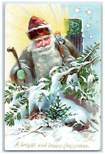 c1910's Christmas Brown Robe Santa Claus Sack Of Toys Embossed Tuck's Postcard picture