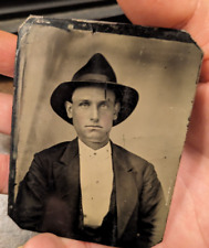 1880s tintype photograph rustic handsome young man wearing hat plain backdrop picture