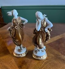 A pair of Dresden Gold & White Porcelain figurines picture