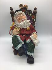 Santa Clause Sitting In Chair (Poly Resin Material 11 Inches X 6 Inches) picture