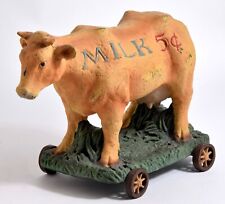 Dairy Cow on Wheels Figurine, 11