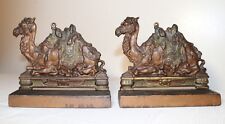 pair of high quality antique figural solid cold painted cast iron camel bookends picture