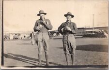 Vintage 1910s WWI RPPC Real Photo Postcard Two Soldiers After a Visit to the PX picture