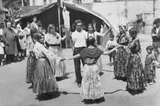 Young women dance around groom during a traditional Romani wedding Old Photo picture