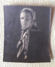 A very small photo of a beautiful woman.    Vintage photo  picture