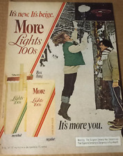 1982 print ad page - More Cigarettes - Girl guy play snow basketball Advertising picture