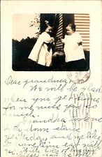 ANTIQUE C.1905 PHOTO POSTCARD TWO BEAUTIFUL CHILDREN HOLDING HANDS picture