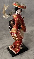 Japanese Geisha Figurine Red Kimono & Hat Wooden Stand 11.5” Tall picture