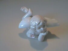 VINTAGE PORCELAIN ANGEL LYING WITH HAND ON HER CHIN  picture