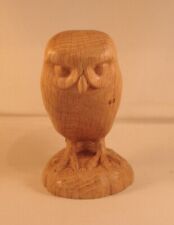 Little Owl carved in English Oak displayed on sitting on a rock picture