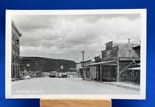 RPPC Postcard Goldfield, Nevada Town Hotel Drugstore Old Car Real Photo c.1950's picture