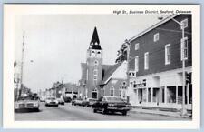 1970's SEAFORD DELAWARE HIGH ST BUSINESS DISTRICT CHURCH CLASSIC CARS POSTCARD picture
