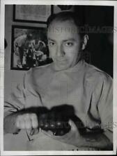 1947 Press Photo Dr. Walter Jacobs holding prosthetic limb picture