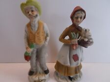 PAIR OF PORCELAIN FIGURINES OF ELDERLY COUPLE/  picture