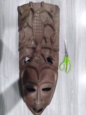 Hand carved Indonesian wooden face mask picture