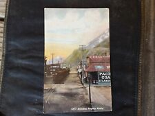 Vintage Unused 1217 Broadway Skagway Alaska Postcard Eph Americana Railway Signs picture