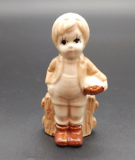 Vintage Porcelain Boy with Basket Figurine picture
