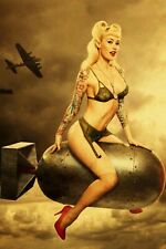 beautiful woman sitting on air bombs WW2 Photo Glossy 4*6 in Q021 picture