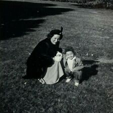 Woman In Fur Coat Crouching With Boy In Hat B&W Photograph 2.75 x 4.5 picture
