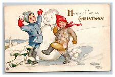 Vintage 1900's Christmas Postcard Embossed Boys Making a Snowman Gold Lettering picture