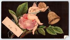 1876 VICTORIAN L PRANG HAPPY NEW YEAR CHERUB BELL PINK ROSE ANTIQUE CARD*CORNER* picture