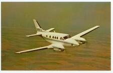 c1970s Beechcraft King Air E90 airplane in flight advertising pc - N9502Q(?) picture