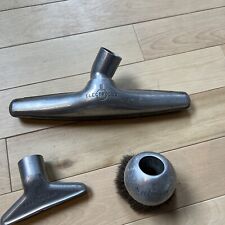 three vintage metal Electrolux attachments picture