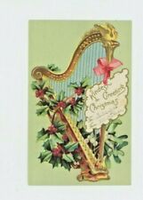 Vintage Christmas  Postcard    GOLDEN HARP AND HOLLY   EMBOSSED  UNPOSTED UDB picture